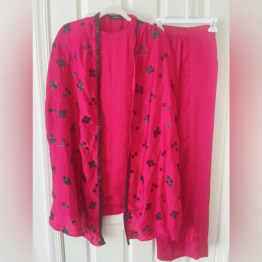 Pakistani fashion double shirt with trouser silk material wore once